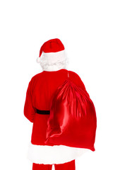 Santa Claus carrying sack with presents and turned back on white background
