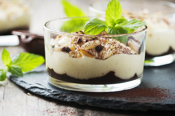 Sweet homemade dessert with cream and chocolate