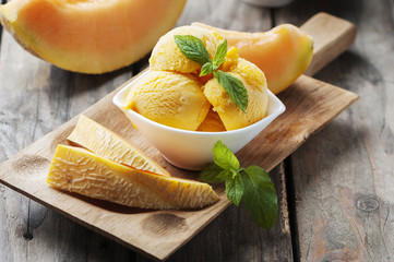 Fresh ice-cream with melon and mint