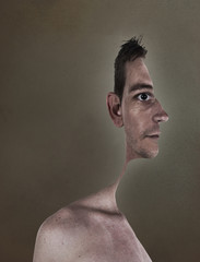 surrealistic portrait of a young man with cut out profile