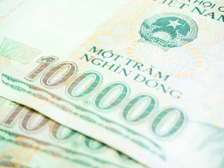 Selective Focus one hundred thousand banknote, money of Vietnam
