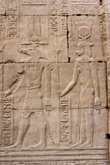 Hieroglyphic carvings on the exterior walls of  egyptian temple