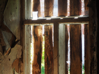 abandoned house, inside, boarded-up windows