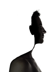 surrealistic portrait of a young man with cut out profile - 119745558