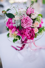 Wedding ceremony decoration. Table flowers decor. wedding arch decorated with flowers.