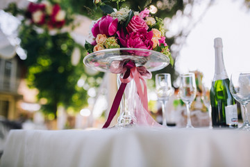 Wedding ceremony decoration. Table flowers decor. wedding arch decorated with flowers.