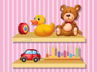 Many toys on wooden shelf