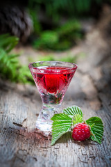 Tasty raspberries liqueur made of fruits and alcohol
