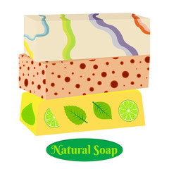 Pieces of natural soap with herbs and fruits.