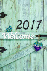 Welcome sign with year 2017 and hearts