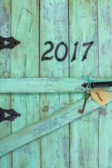 2017 and skeleton key with success tag hanging on door