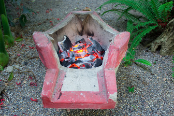 Charcoal Stove burning in stove