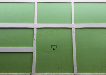 street basketball on the green wall