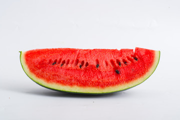 Slice of watermelon on white background