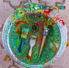 Paint brushes in the sink