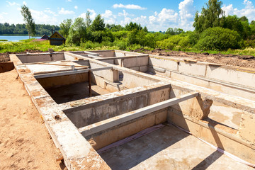 View of construction site and house foundation in preparation pr