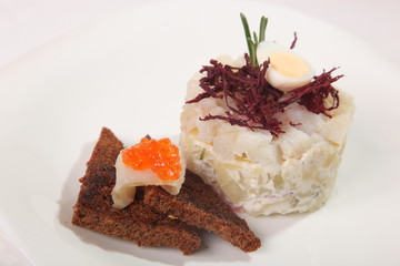 fish salad with potatoes and egg