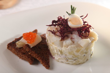 fish salad with potatoes and egg