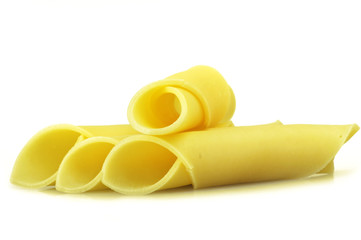 Swiss cheese slices close up on the white
