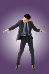 Holding pose of Asian business man