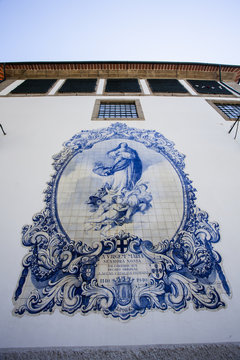 Rich decorated wall with blue tiles (azulejos) of the Lar de Santa Stefania convent in Guimaraes in Portugal, Europe 