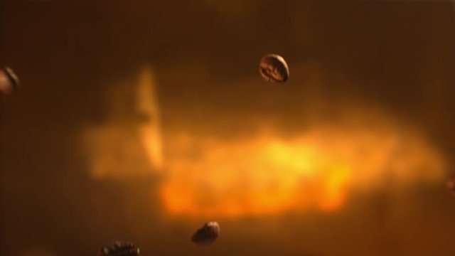 Falling of Coffee Beans Dowm in Macro with Golden Background