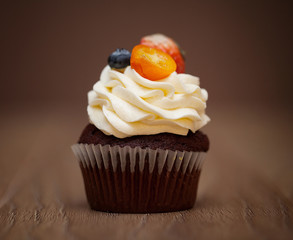 Chocolate cupcakes on a brown table
