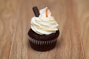 Chocolate cupcakes on a brown table