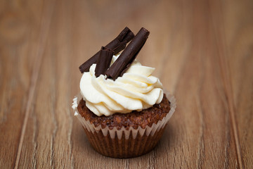 Chocolate cupcakes on a brown table