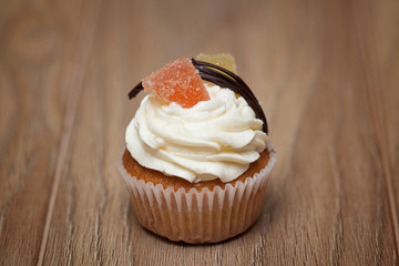 Chocolate cupcakes on a brown table