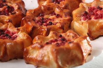 sweet baked cakes with berries