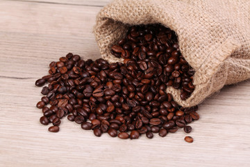 a spilled coffee bag in spotlight