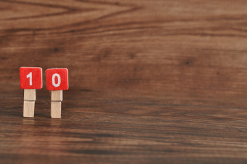 Number 10 displayed on a wooden background