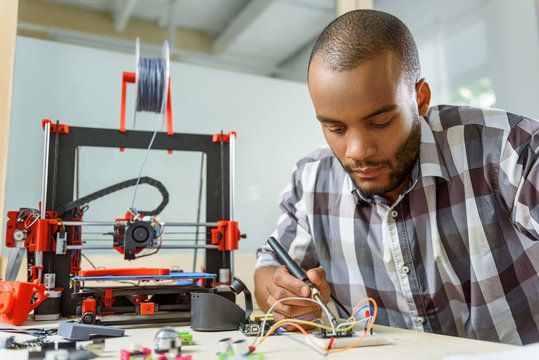 Professional male engineer working with 3d details