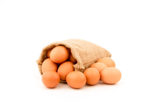 Eggs wrapped in sackcloth isolated on white background