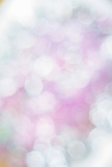 Blurred background with bokeh lights in pastel colours