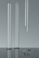 3 test tubes, one broken