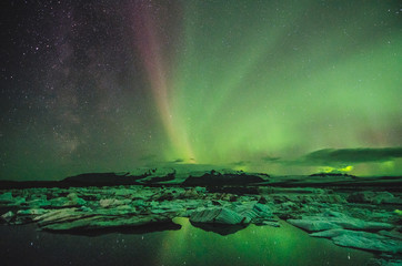 Northern lights over the ice lagoon, Iceland - obrazy, fototapety, plakaty