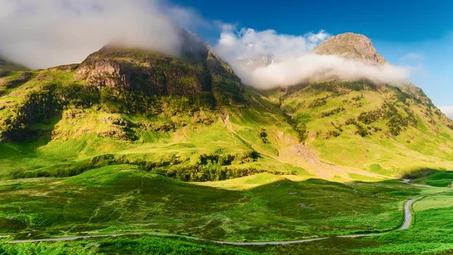 Dawn over the mountains of Glencoe in Scotland, 4k, timelapse