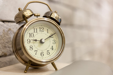 Retro alarm clock on table