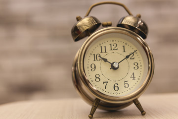 Retro alarm clock on table