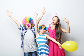 Portrait of childrens on grey background