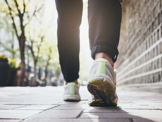 Woman Walking outdoor Jogging exercise with Morning light Health