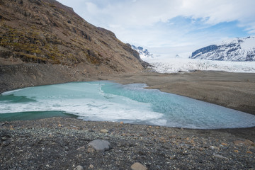 The pool getting frost in Skaftafell national park of southern Iceland.