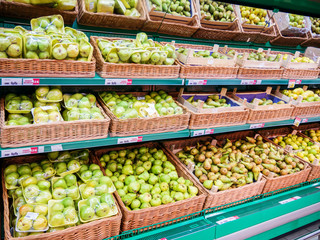 Fresh fruits on shelf in supermarket