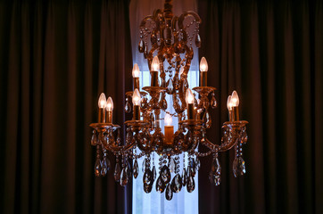 shining chandelier and curtain