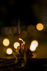 Candles ritual significance in Buddhism. Asalha Puja Day