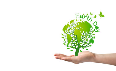 Earth day concept of tree with earth in hand on white background