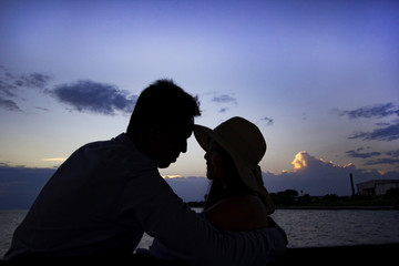 Silhouette of couples at twilight