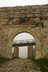 Naklejka premium View of Kalemegdan fortress at fog from below fortress walls, Belgrade, Serbia